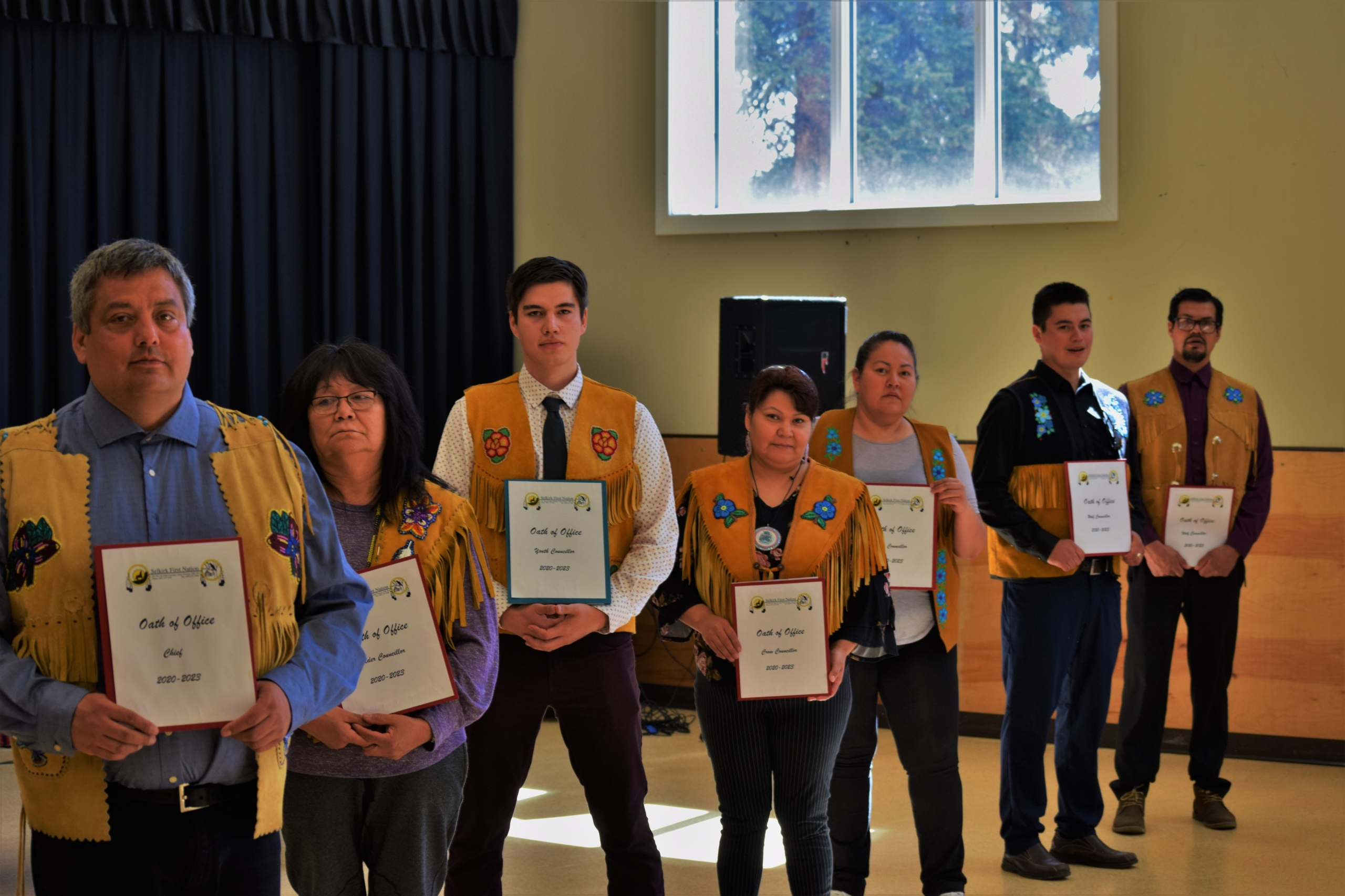 From Left to right: Chief Sharon Nelson, Wolf Councillor, George McGinty, Youth Councillor, Morris Morrison, Wolf Councillor, Dean Gill, Elder Councillor, Milly Johnson, Crow Councillor, Nesta Hager, missing Crow Councillor, Teddy Charlie 